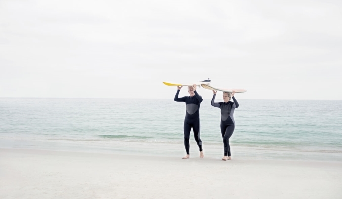 Couple with Surfboards